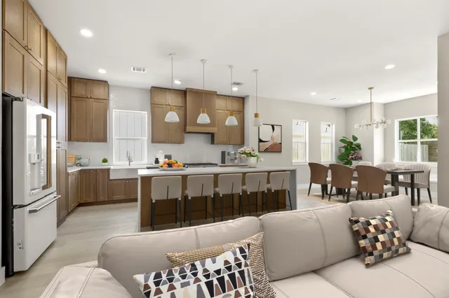 a large kitchen with stainless steel appliances kitchen island granite countertop a large counter top stainless steel appliances and cabinets