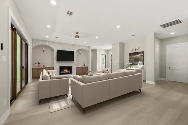 a dining room with furniture and window