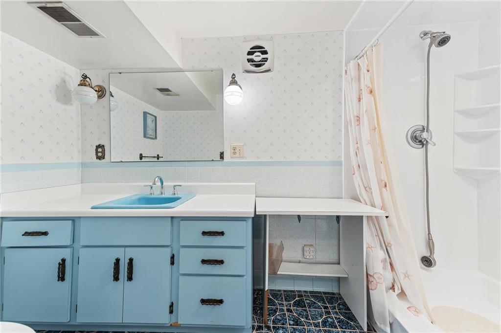 132 Shafer Road Moon Township, PA 15108 - Photo 12 of 15 a bathroom with a sink a toilet and shower