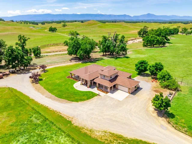 a view of a swimming pool with an ocean view
