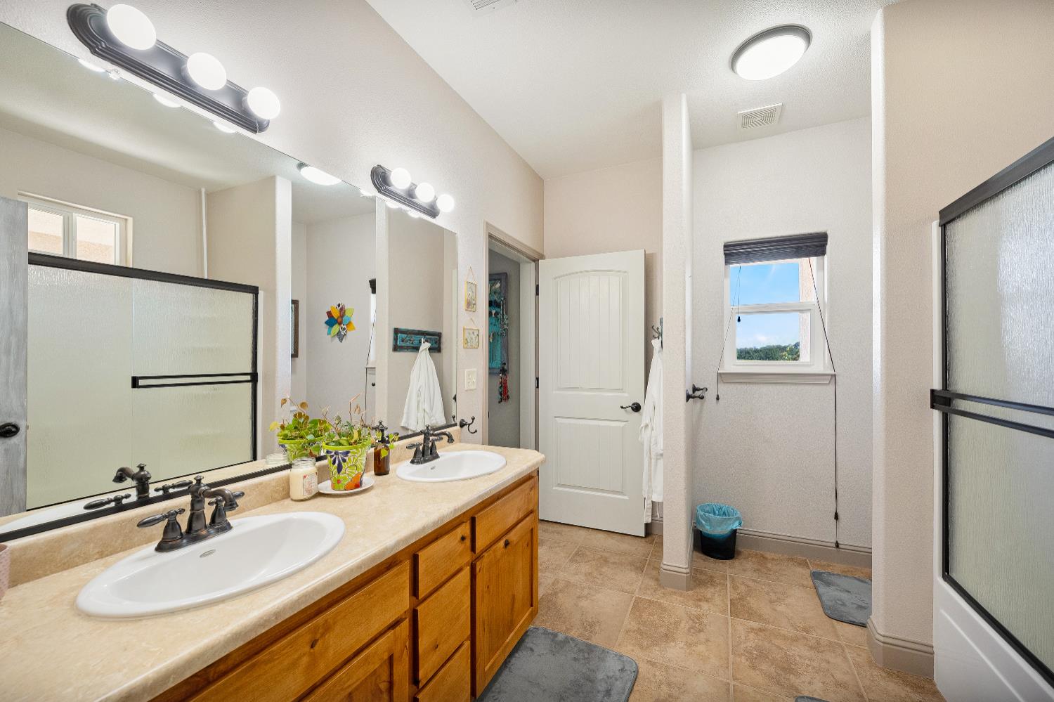 15605 Johnson Road Red Bluff, CA 96080 - Photo 26 of 88 a bathroom with a sink double vanity and a mirror