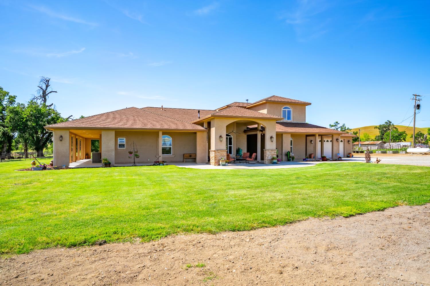 15605 Johnson Road Red Bluff, CA 96080 - Photo 54 of 88 a front view of a house with a garden