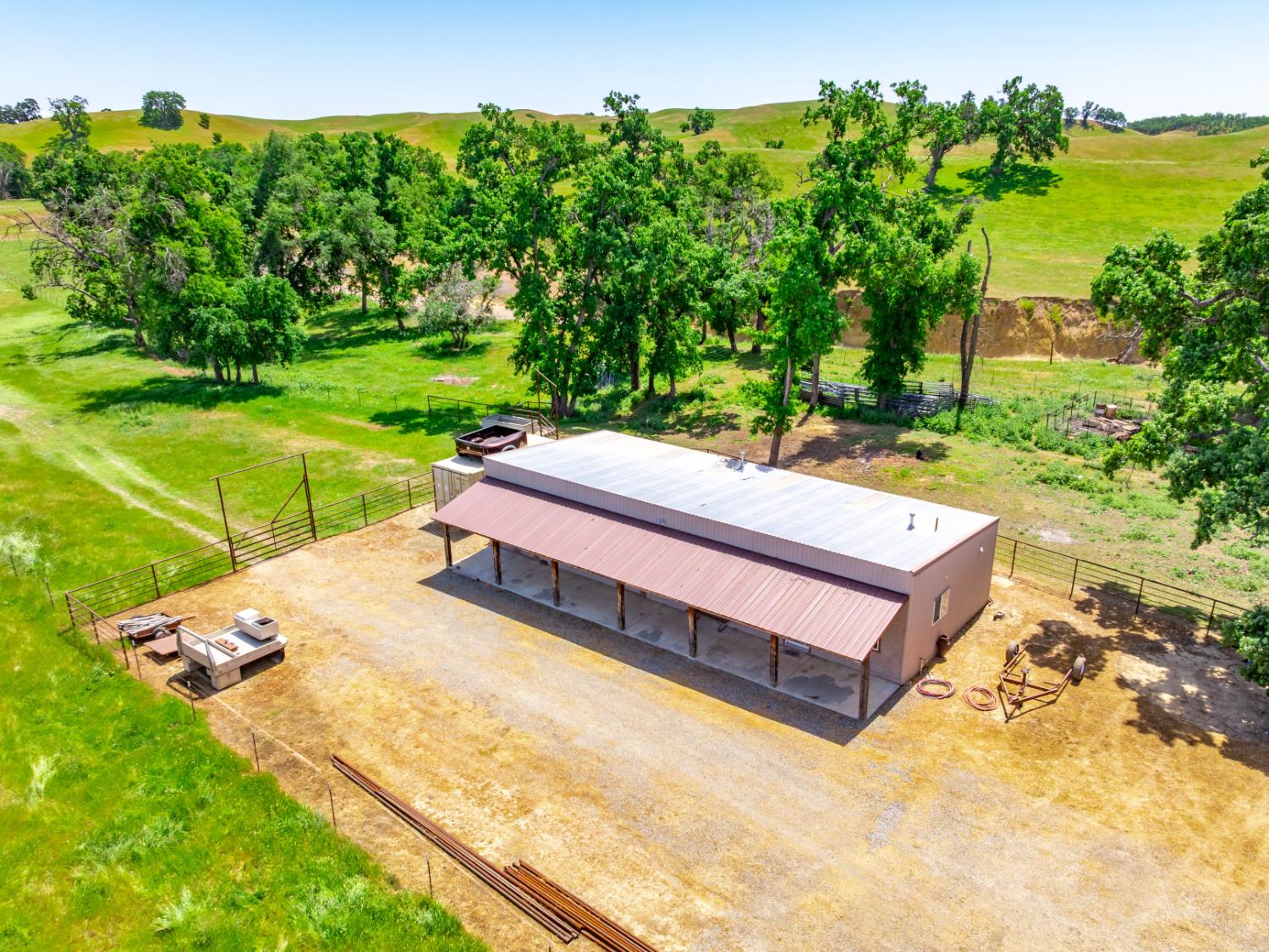 15605 Johnson Road Red Bluff, CA 96080 - Photo 8 of 88 a wooden bench sitting in the middle of a park