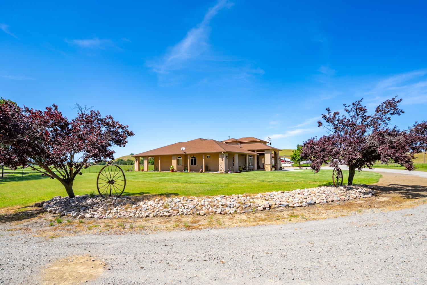 15605 Johnson Road Red Bluff, CA 96080 - Photo 81 of 88 a front view of a house with a yard and trees