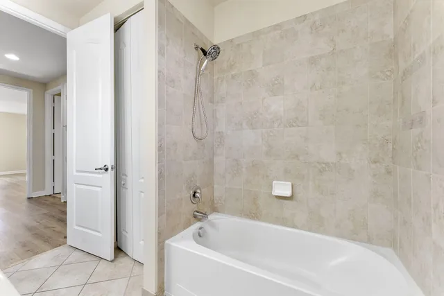 a view of a house with a yard and garage