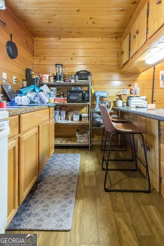 a view of balcony and wooden floor