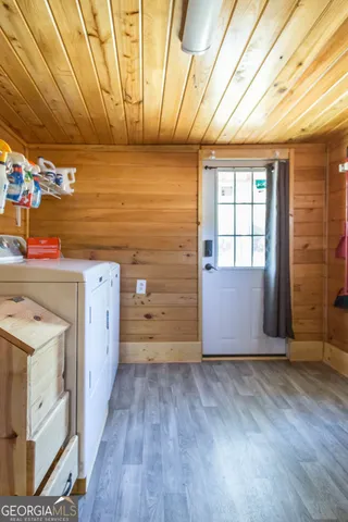 a utility room with dryer and washer