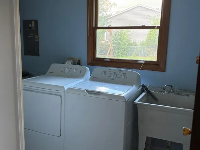 a utility room with dryer and washer