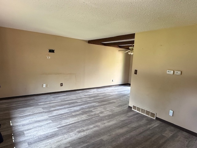 7503 Windsor Avenue Spring Grove, IL 60081 - Photo 4 of 14 a view of a room with wooden floor and a ceiling fan