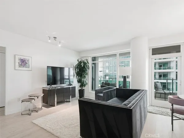 a kitchen with a sink and a stove top oven