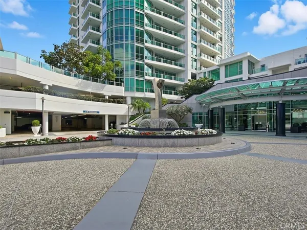 a front view of building with yard