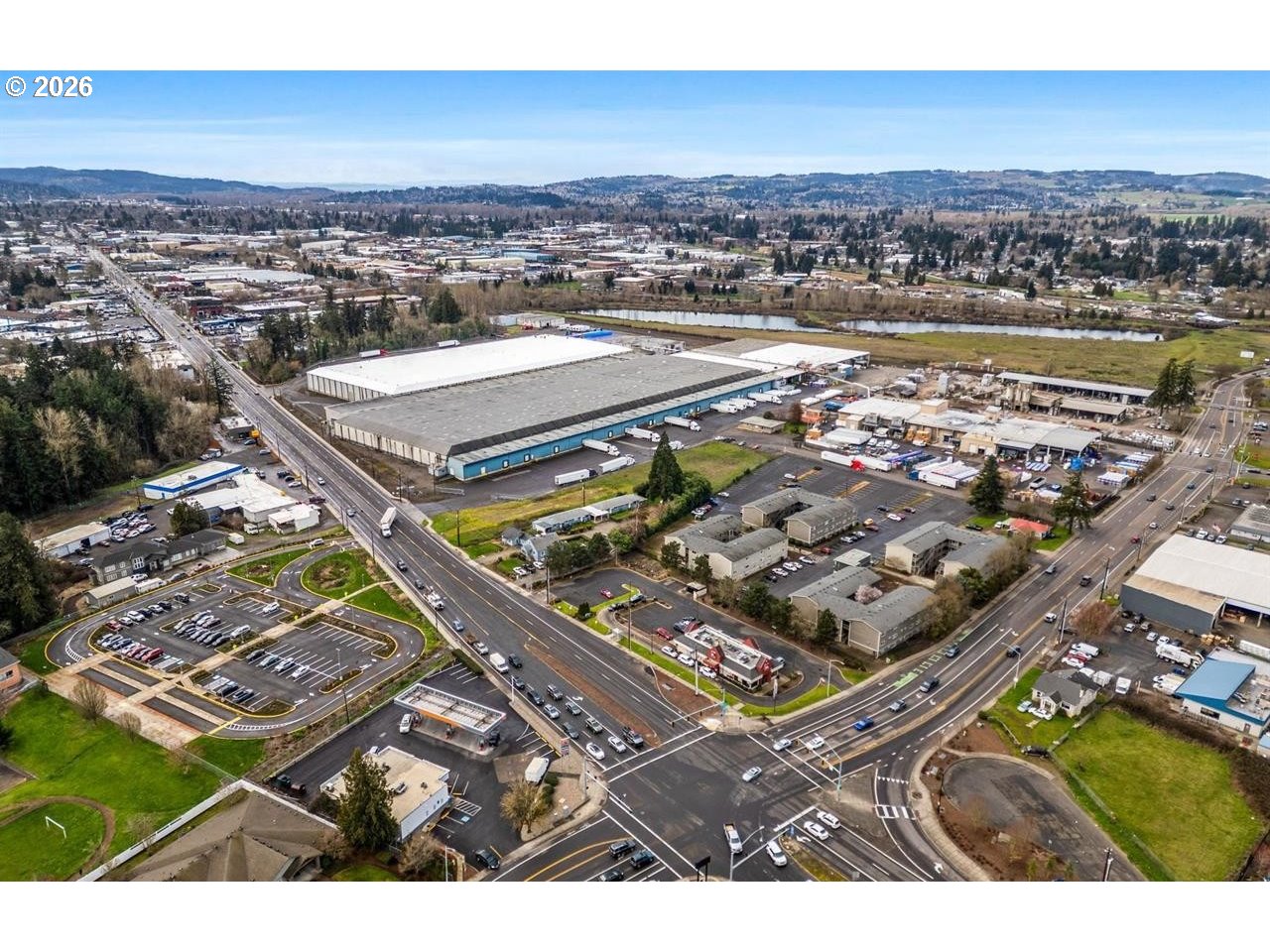 4125-4135 Portland Road Northeast Salem, OR 97301 - Photo 4 of 16 an aerial view of a residential building and an ocean