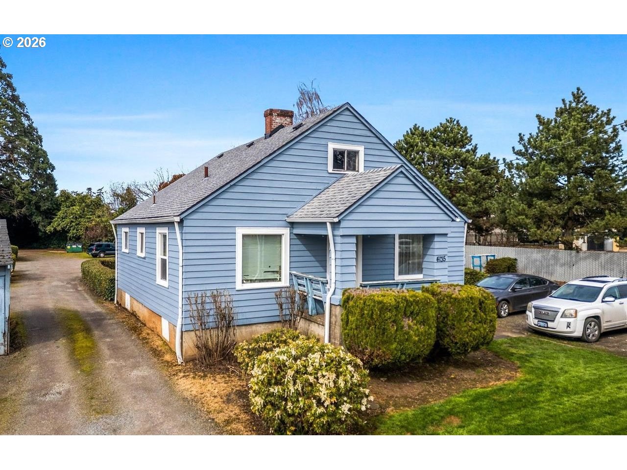 4125-4135 Portland Road Northeast Salem, OR 97301 - Photo 9 of 16 a view of a house with a patio