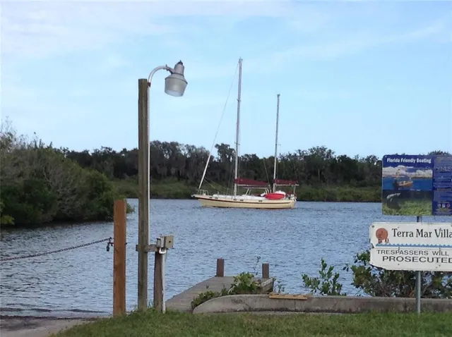 a view of a wooden fence and a bench