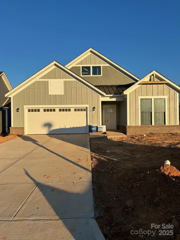 a front view of a house with yard