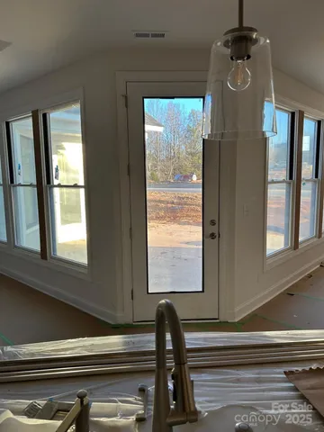 a view of a windows and ceiling fan