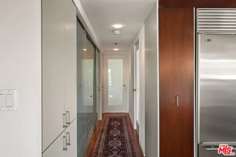 a view of empty room with windows