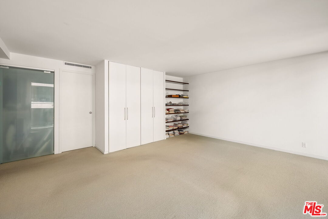 535 Ocean Avenue, Unit 5C Santa Monica, CA 90402 - Photo 21 of 29 an empty room with a closet