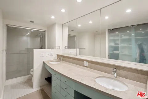 a view of a living room and bathroom