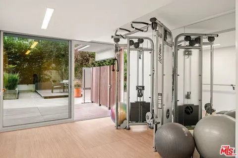 a view of a building with garden and plants