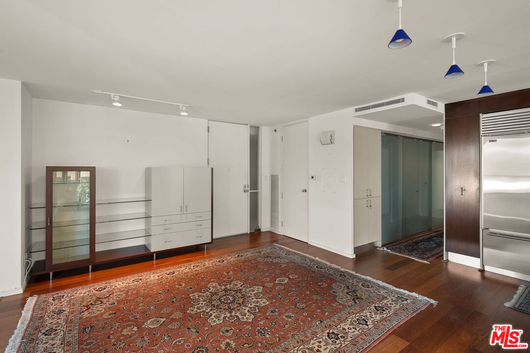 535 Ocean Avenue, Unit 5C Santa Monica, CA 90402 - Photo 9 of 29 a view of livingroom with hallway and wooden floor
