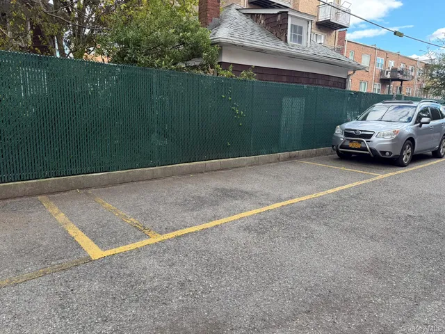 a view of a car parked on the side of the road