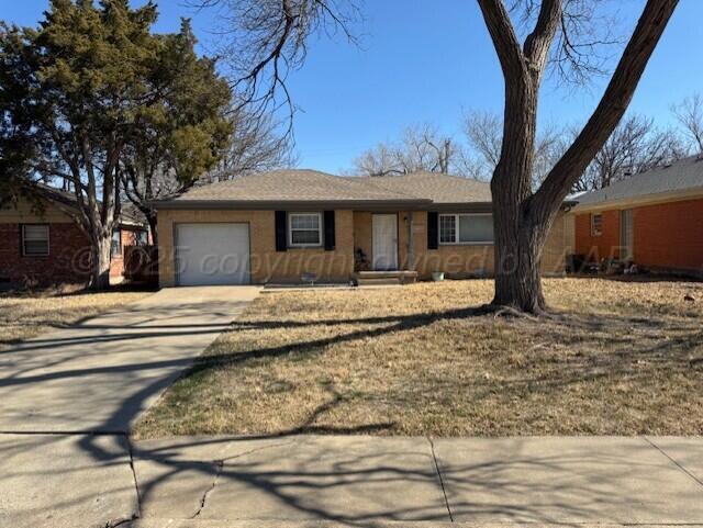 3313 Lenwood Drive Amarillo, TX 79109 - Photo 1 of 10 a front view of house with yard covered in snow