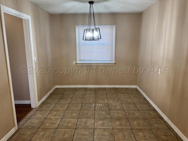 3313 Lenwood Drive Amarillo, TX 79109 - Photo 3 of 10 a view of an empty room with glass door