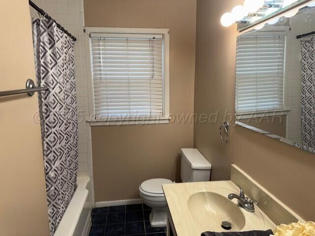 3313 Lenwood Drive Amarillo, TX 79109 - Photo 9 of 10 a bathroom with a sink and toilet