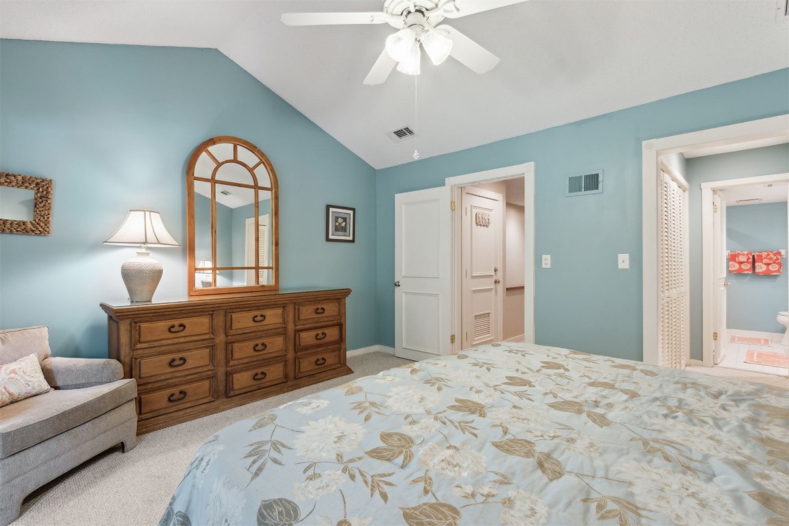 3028 Sea Marsh Road, Unit 3028 Fernandina Beach, FL 32034 - Photo 16 of 39 a bedroom with a bed and a dresser