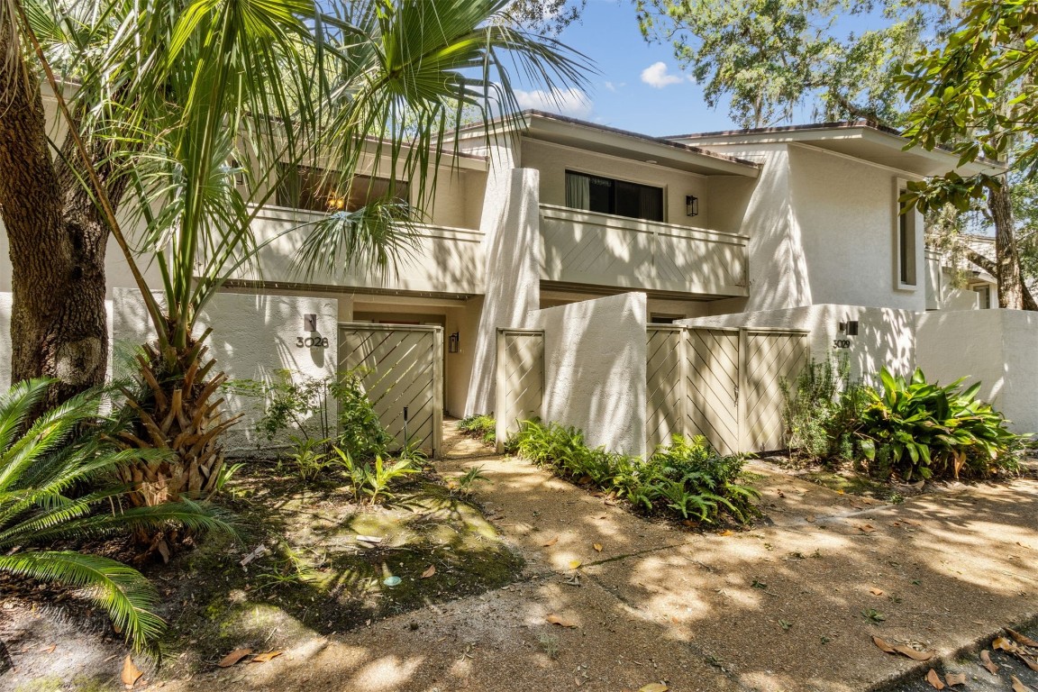 3028 Sea Marsh Road, Unit 3028 Fernandina Beach, FL 32034 - Photo 5 of 39 a view of a house with a yard