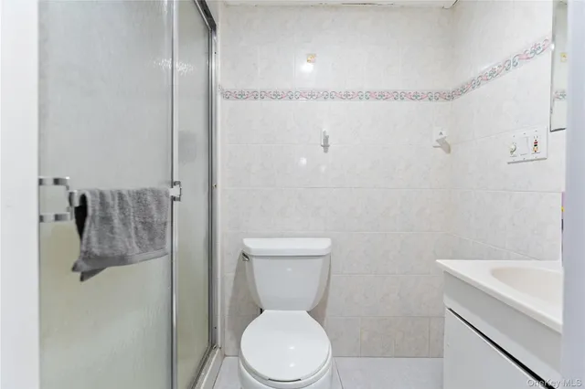 a bathroom with a sink a toilet and a bathtub