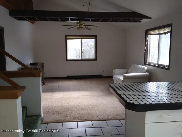 a living room with a couch and a table