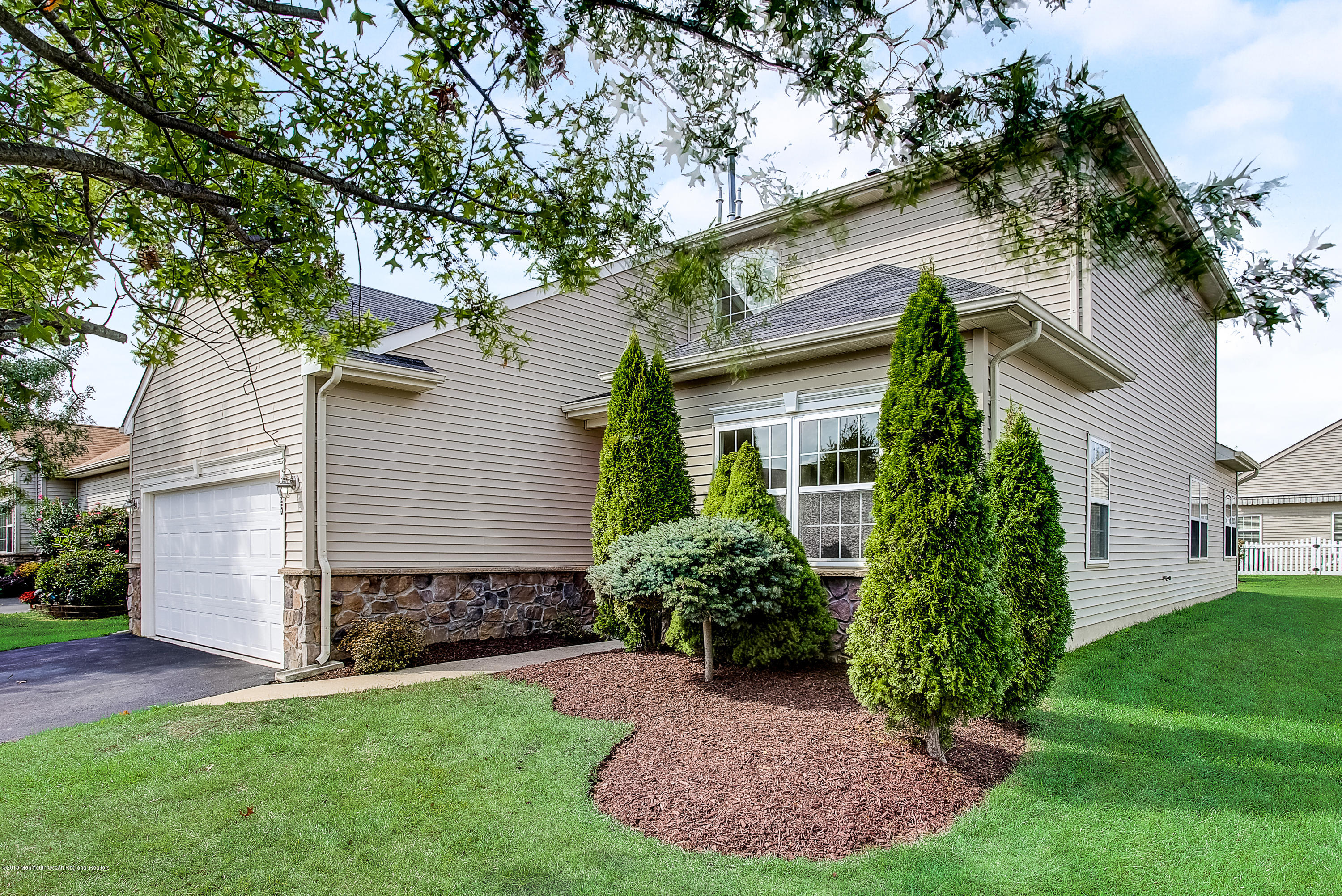 25 Torino Road Manchester Township, NJ 08759 - Photo 2 of 31 front view of a house with a yard