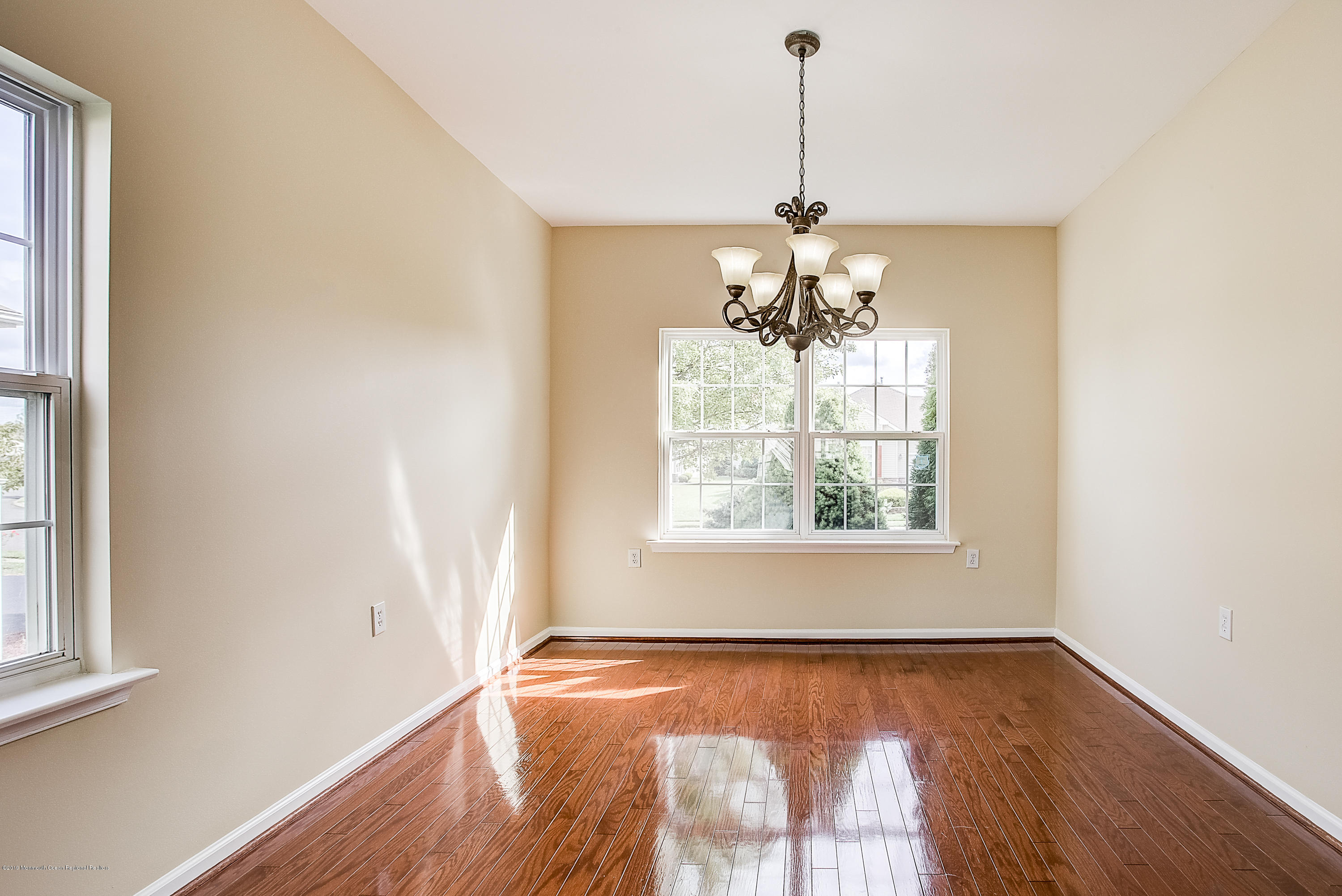 25 Torino Road Manchester Township, NJ 08759 - Photo 13 of 31 a view of a room with wooden floor chandelier and a window