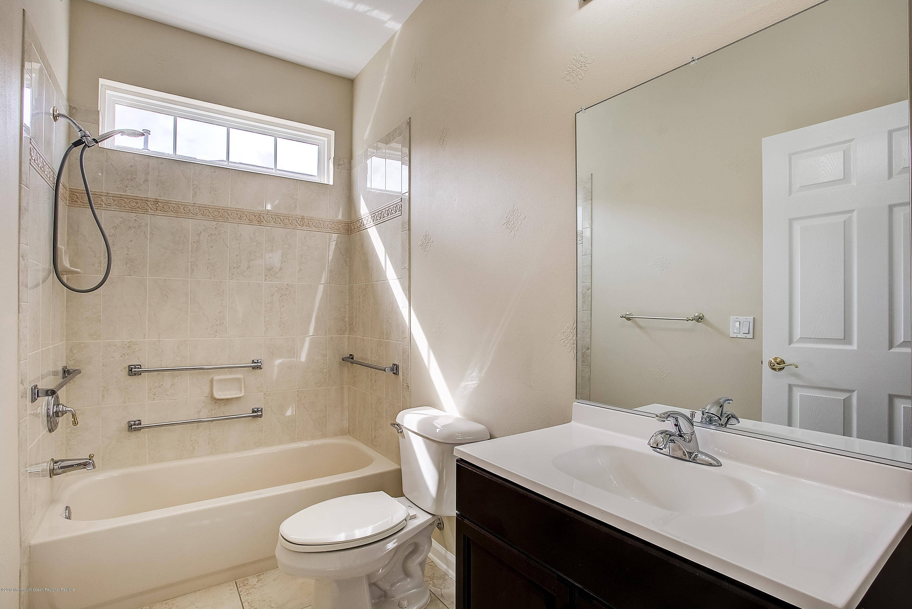 25 Torino Road Manchester Township, NJ 08759 - Photo 18 of 31 a bathroom with a sink a toilet and a bathtub