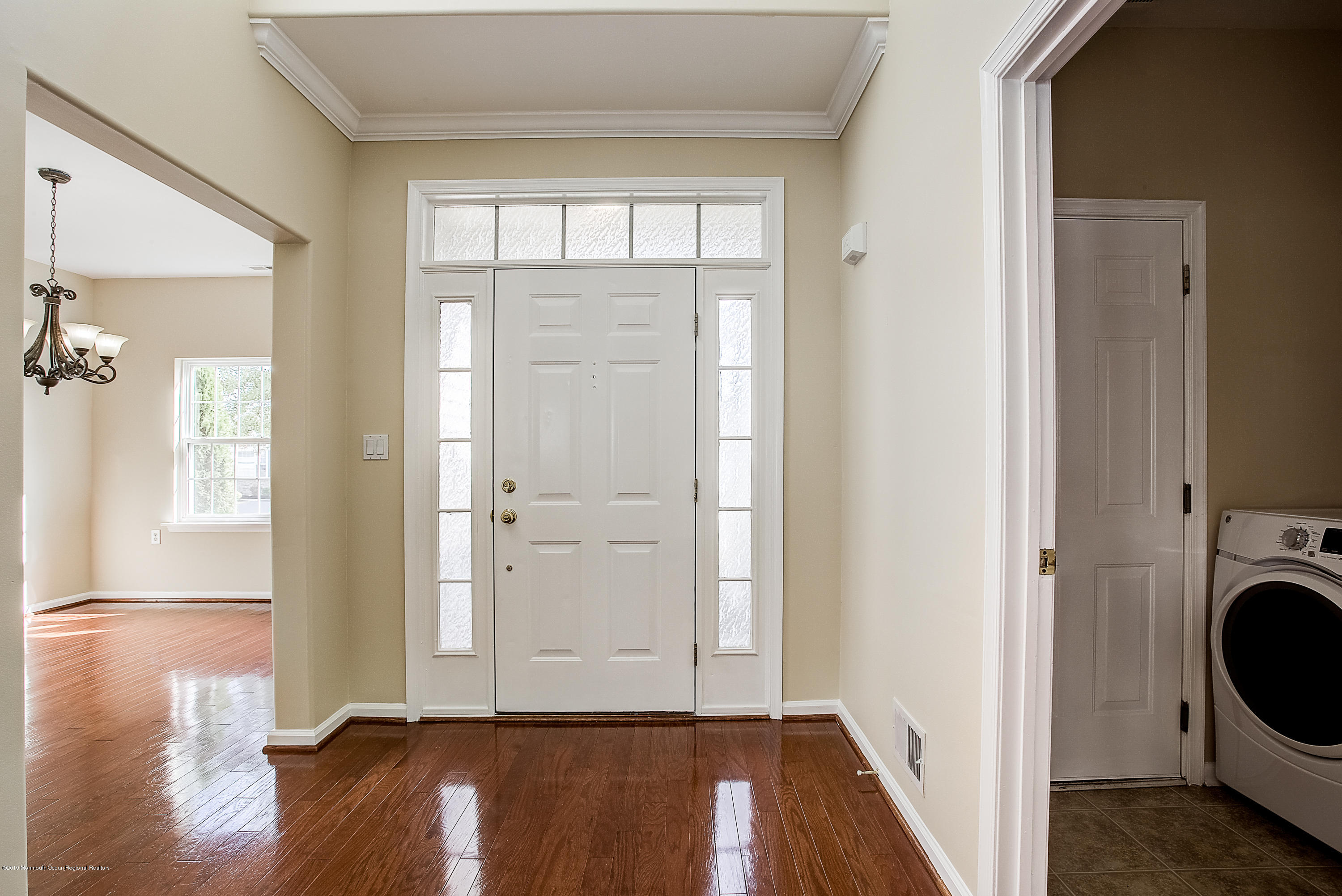 25 Torino Road Manchester Township, NJ 08759 - Photo 3 of 31 a view of a hallway with wooden floor and closet