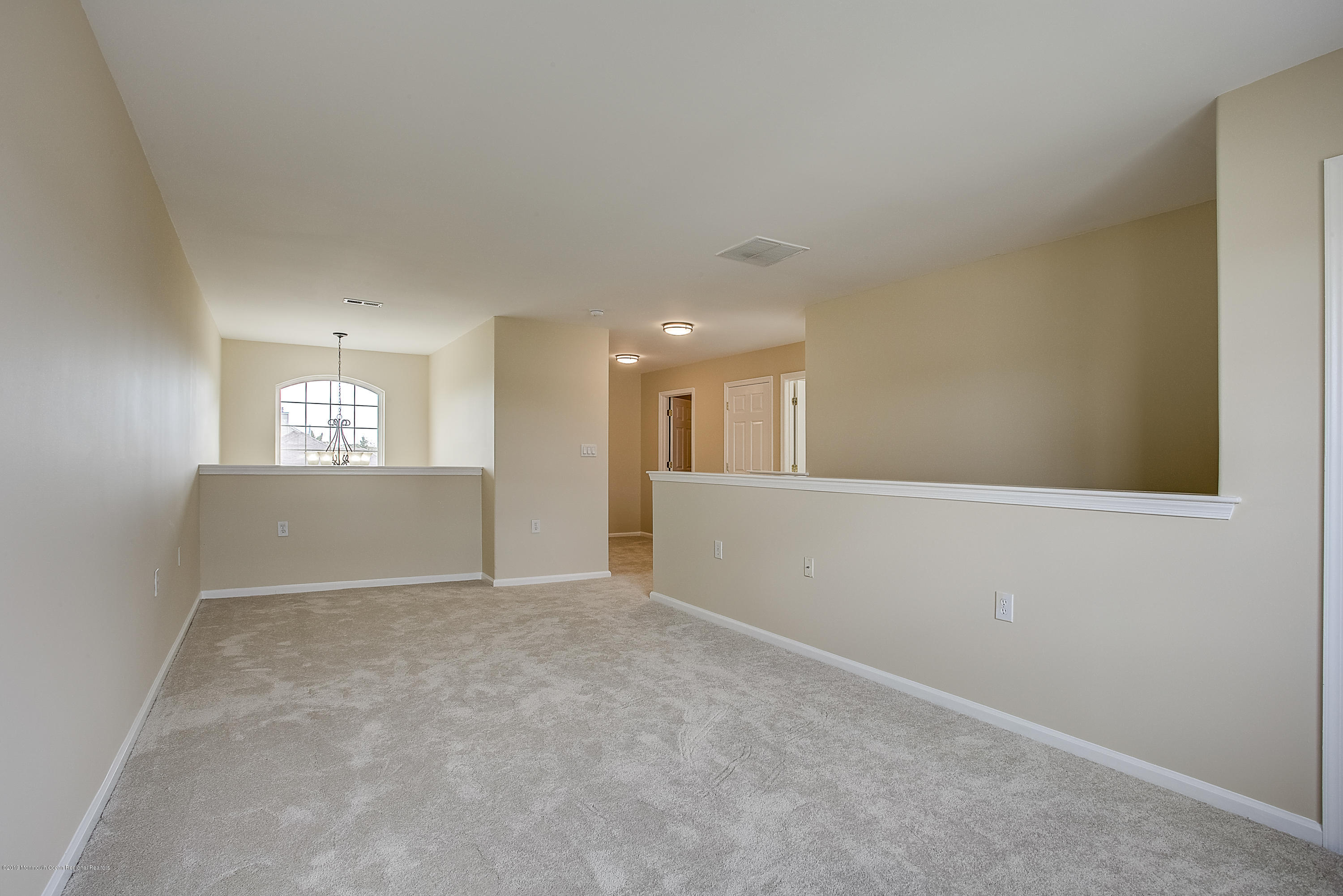 25 Torino Road Manchester Township, NJ 08759 - Photo 26 of 31 a view of an empty room and window