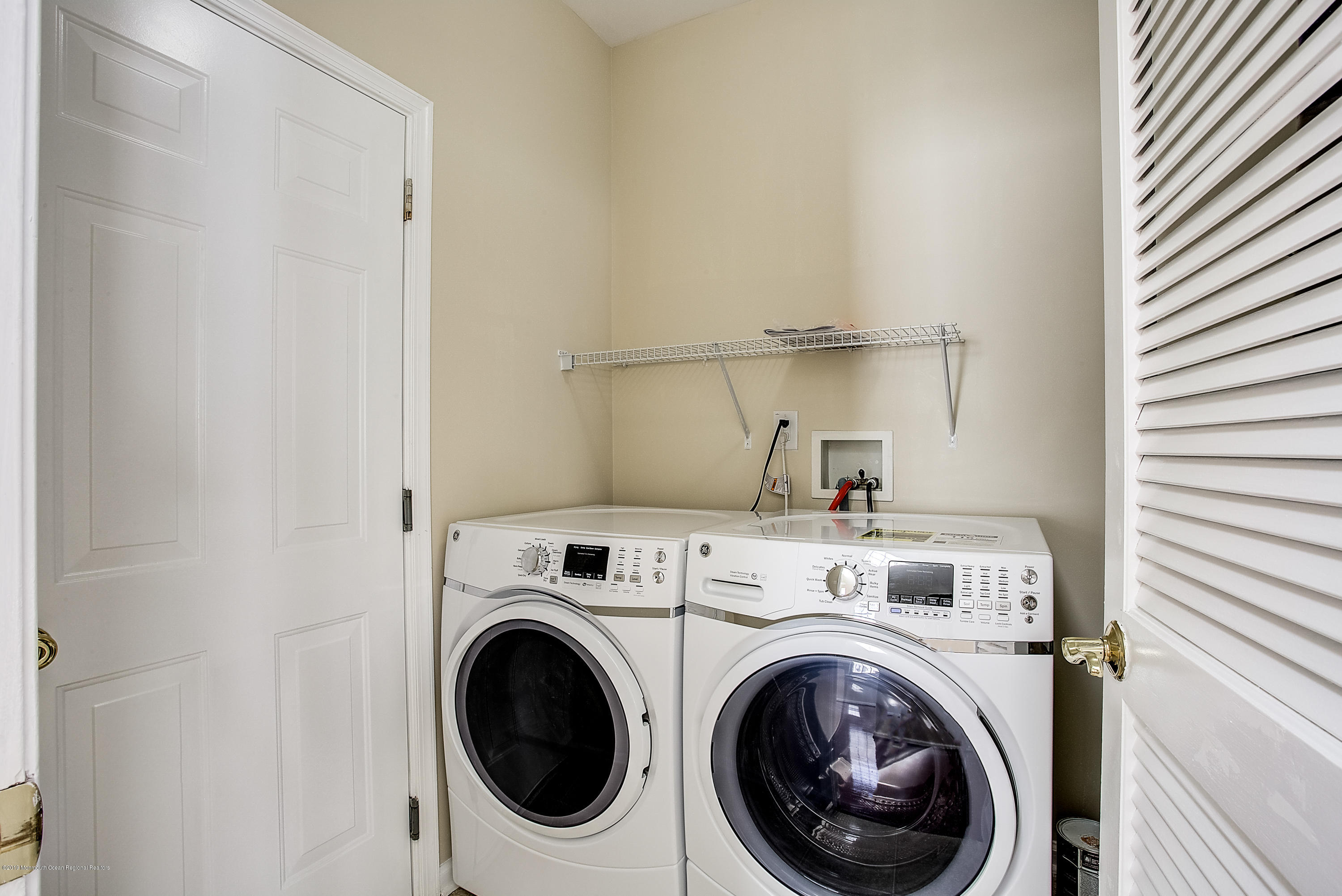 25 Torino Road Manchester Township, NJ 08759 - Photo 29 of 31 a utility room with dryer and washer