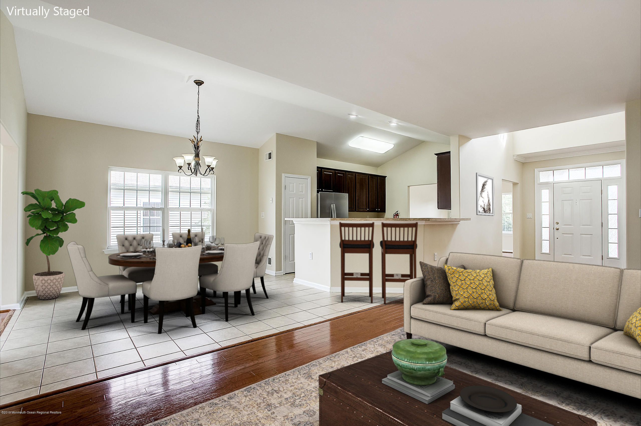 25 Torino Road Manchester Township, NJ 08759 - Photo 5 of 31 a living room with furniture kitchen view and a wooden floor