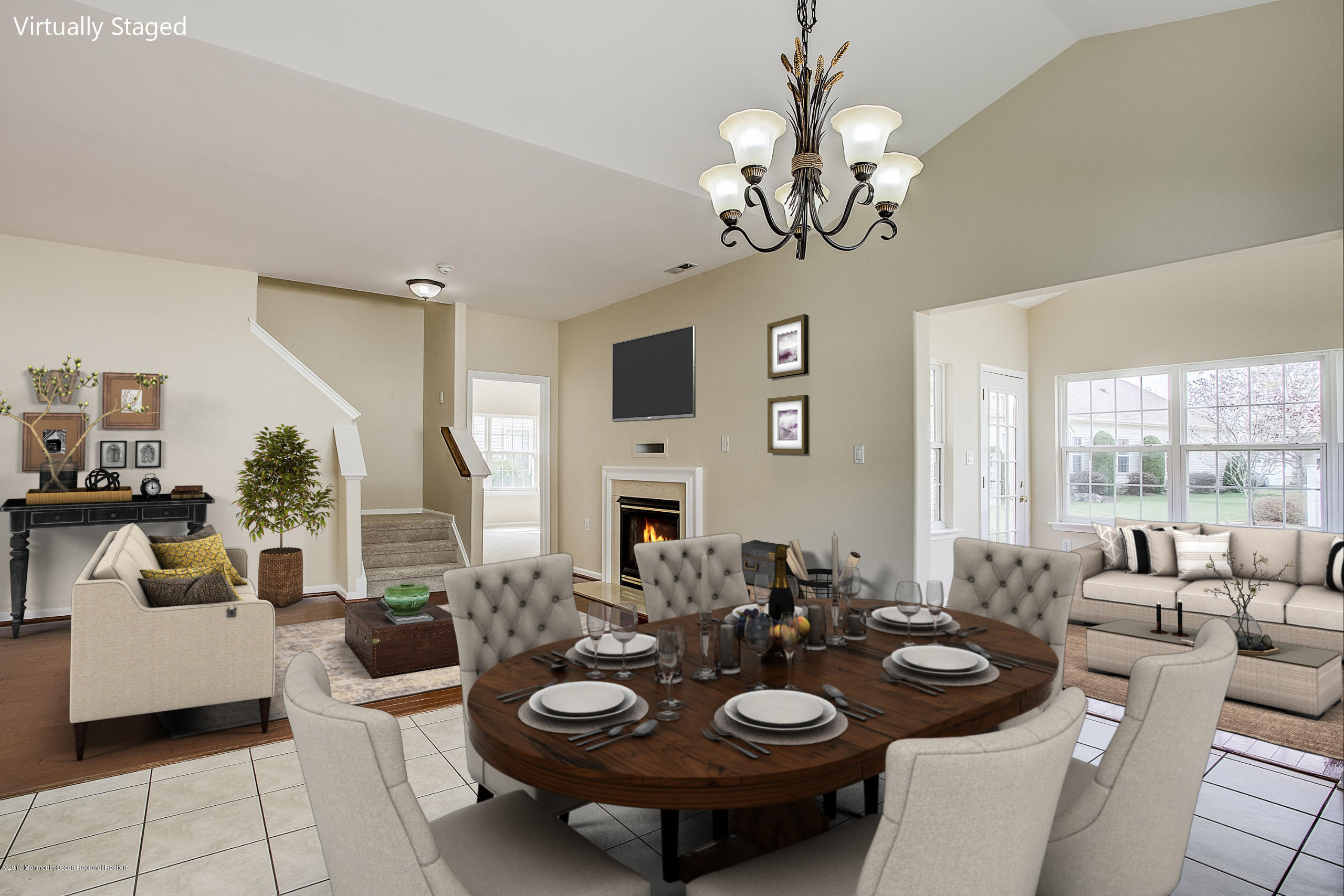 25 Torino Road Manchester Township, NJ 08759 - Photo 10 of 31 a view of a dining room and livingroom with furniture wooden floor a chandelier