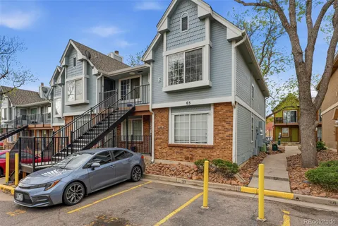 a car parked in front of a house