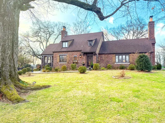 a view of a house with a swimming pool