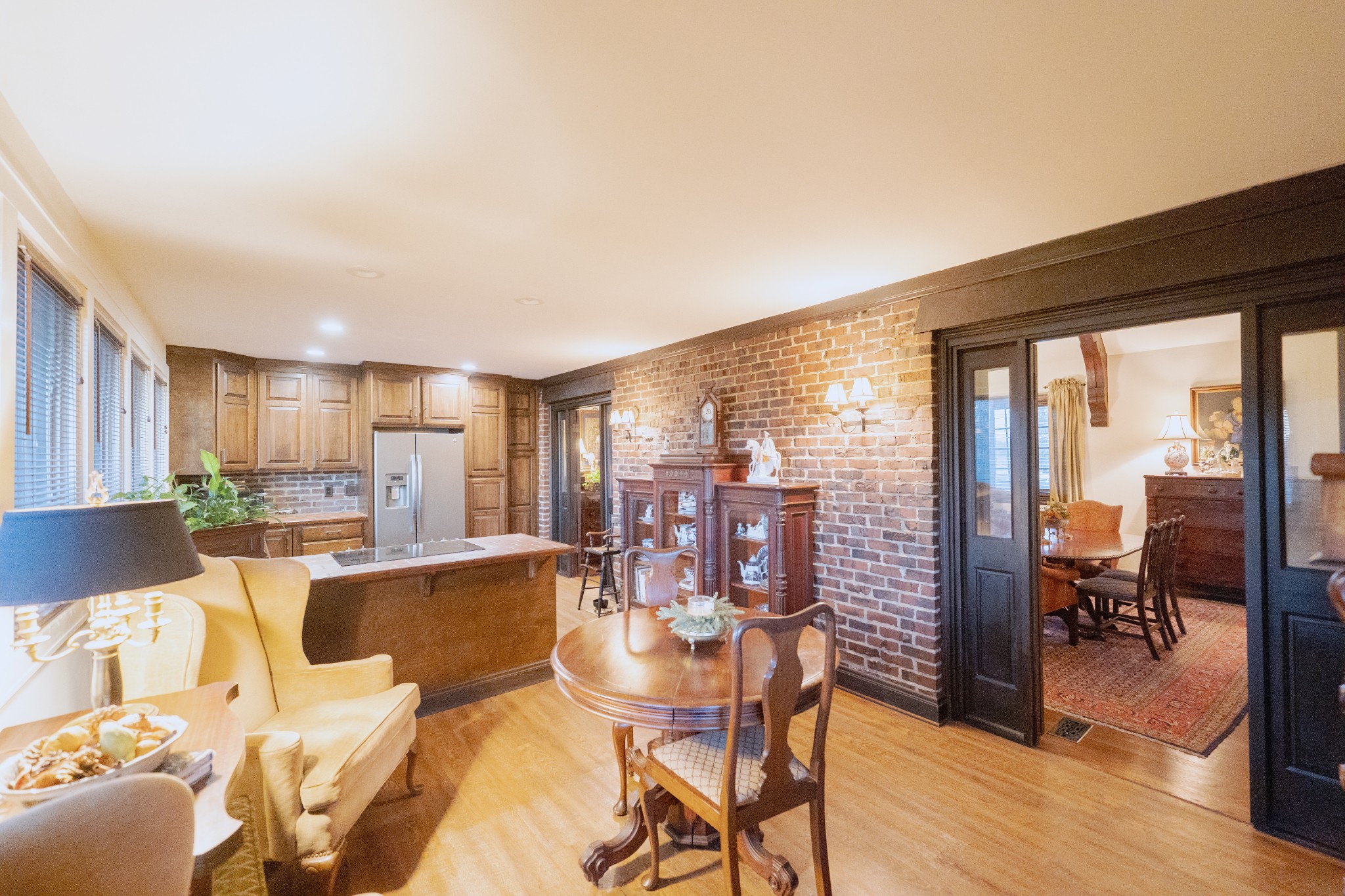 226 Rose Street Pulaski, TN 38478 - Photo 12 of 51 a view of a dining room with furniture window and wooden floor