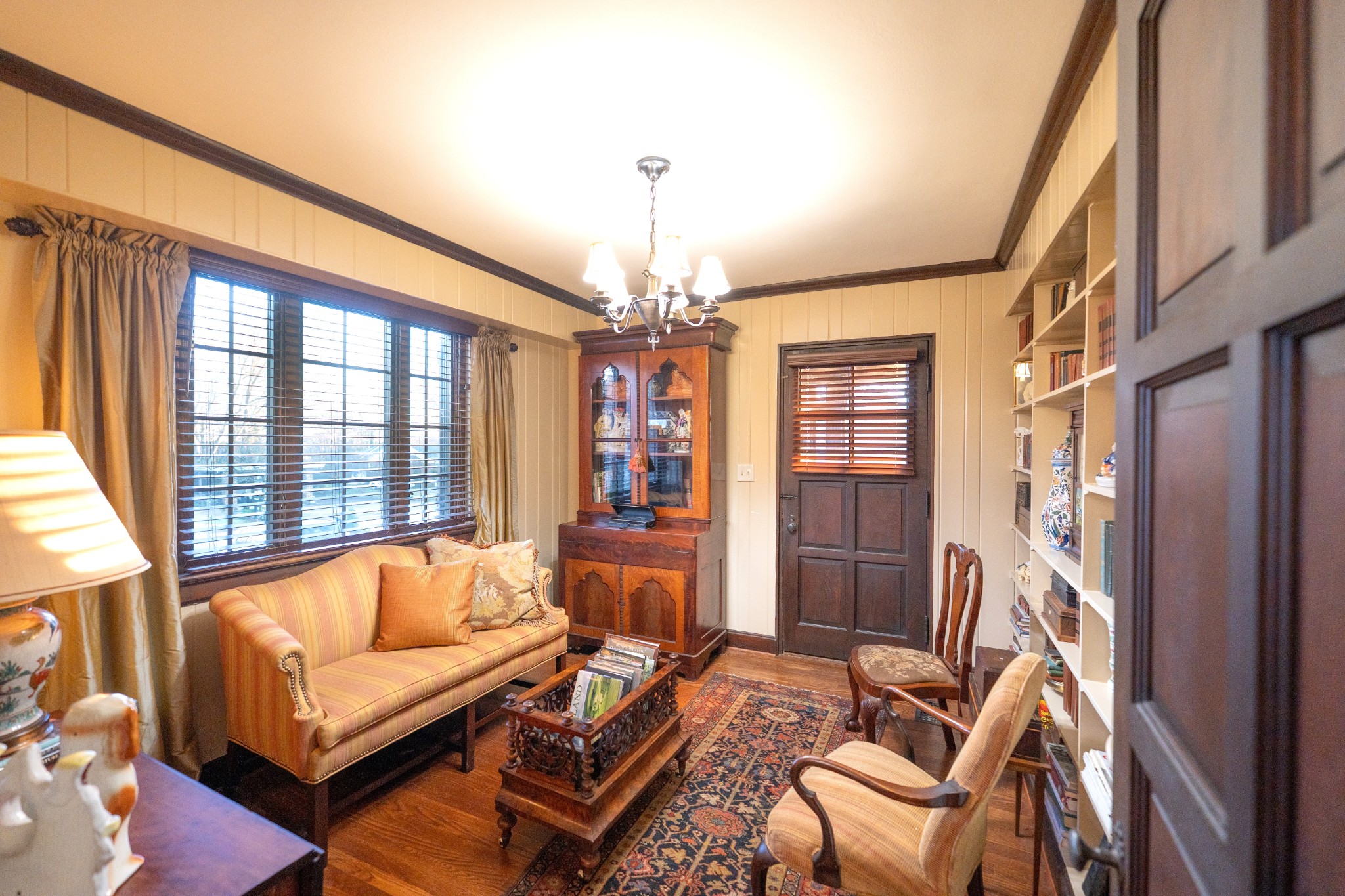 226 Rose Street Pulaski, TN 38478 - Photo 14 of 51 a living room with furniture and a chandelier