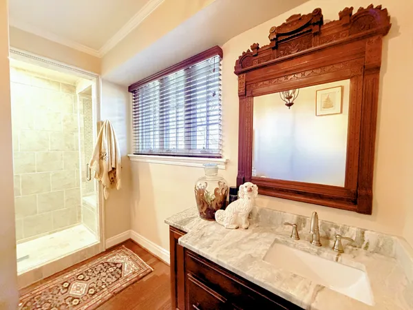 a living room with furniture and large windows