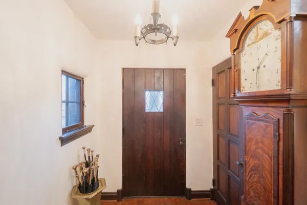a view of a entryway with wooden floor