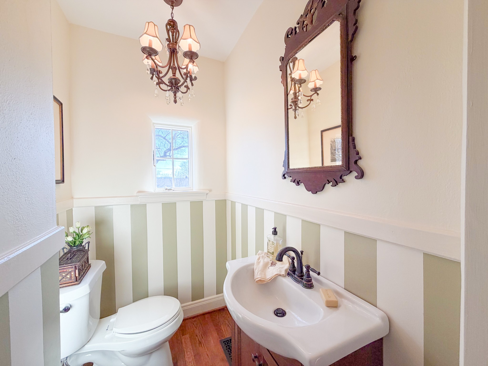 226 Rose Street Pulaski, TN 38478 - Photo 21 of 51 a bathroom with a sink a mirror and a toilet