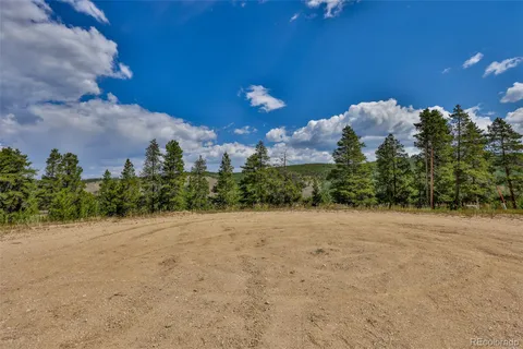 a view of a house with a street
