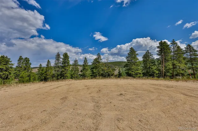 a view of a house with a street